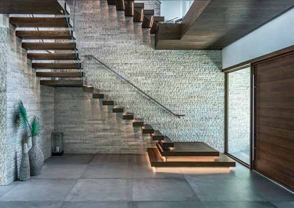 Fort Lauderdale Home Building The Nature of Design - Floating Staircase with Stone Wall