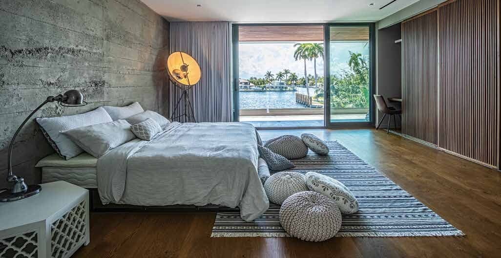 Fort Lauderdale Home Building The Nature of Design - Primary Bedroom with Waterfront View